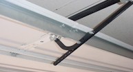 Damage due to improperly installed garage door opener